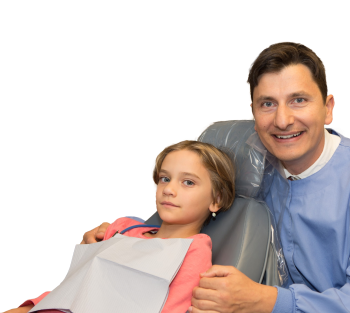 Doctor Paskalev smiling with young female dental patient