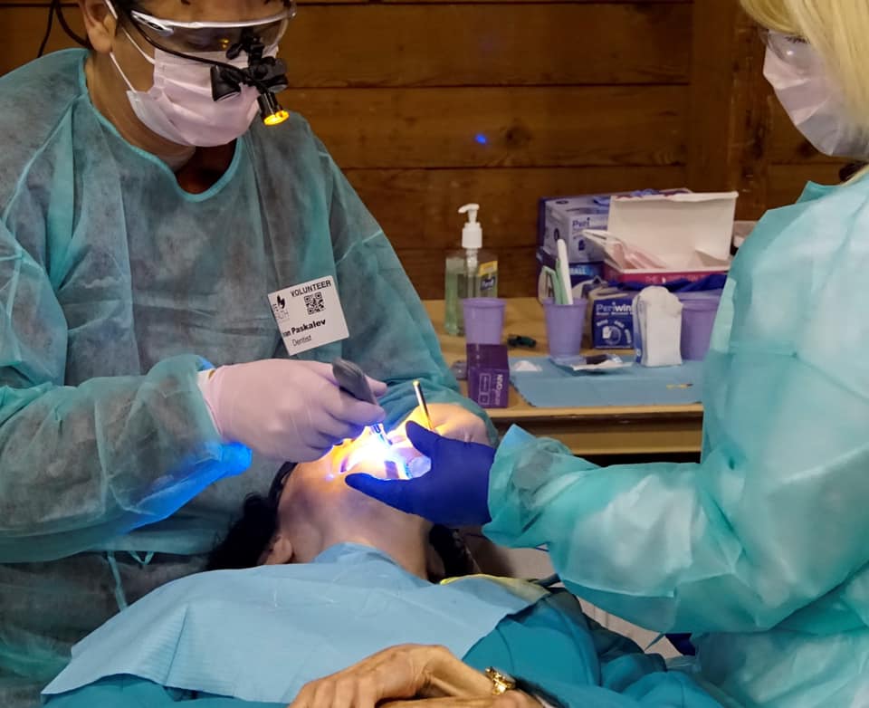 Dentist treating dental patient