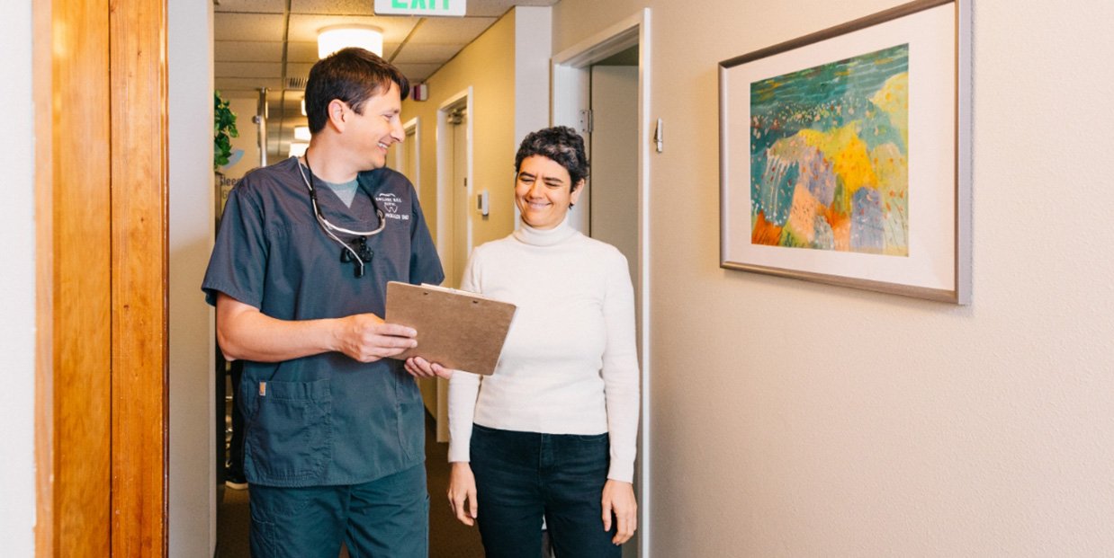 Dental team members walking down hall together