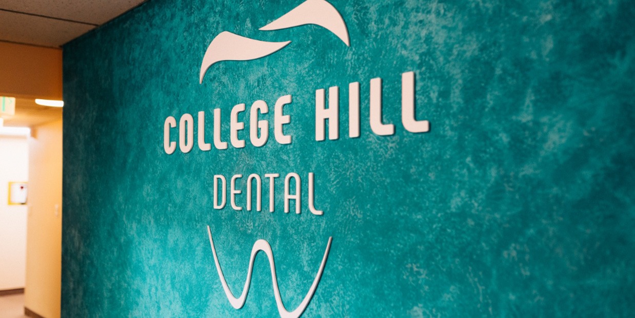 College Hill Dental sign on wall of reception area