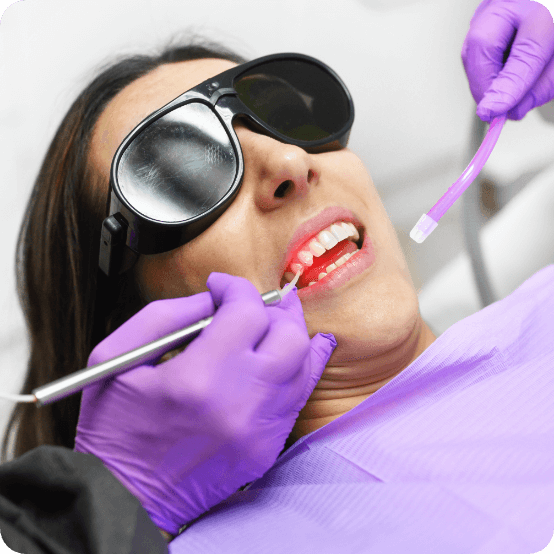 Patient receiving laser periodontal therapy