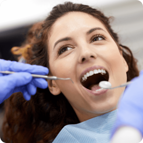 Dental patient receiving oral cancer screening