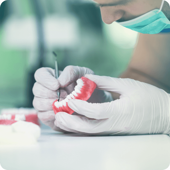 Technician crafting dentures