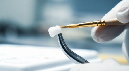 Technician crafting a dental crown