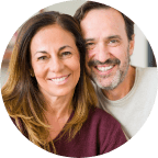 Man and woman smiling together outdoors