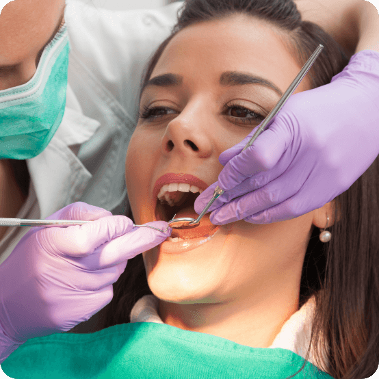 Dental patient receiving root canal treatment